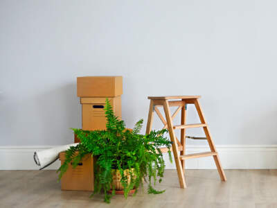 cardboard boxes in empty new apartment